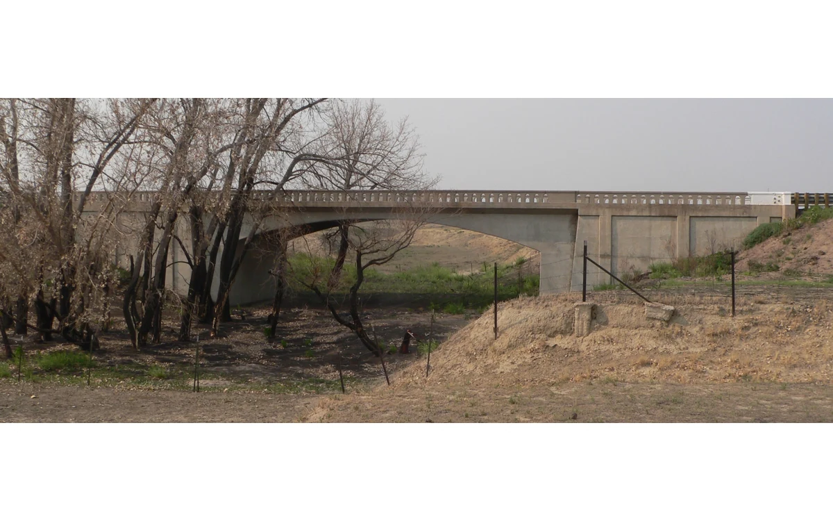Bridge, creek channel and surrounding ground near Last Chance, Colorado.